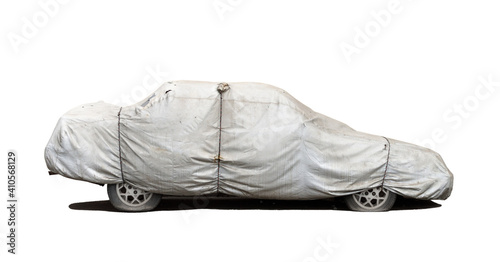 Fotografia Car parked under gray cover