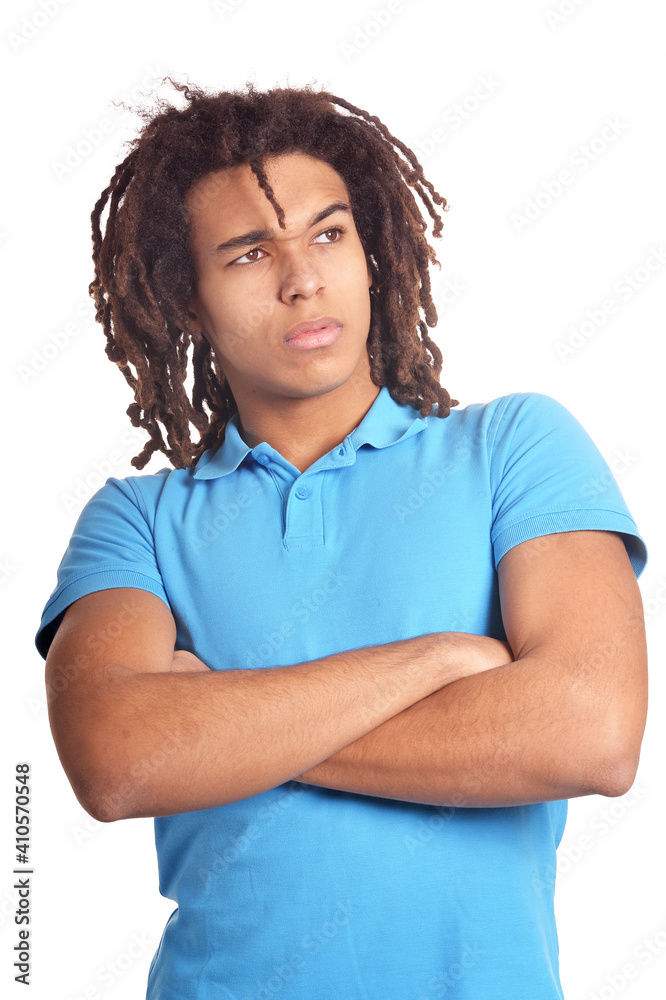Thoughtful African American young man with crossed arms Thoughtful African American young man with crossed arms