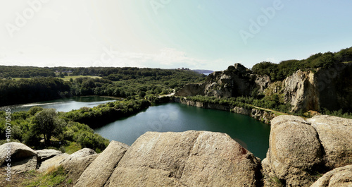 view of the beautiful lake with a rocky shore on the island of Bornholm