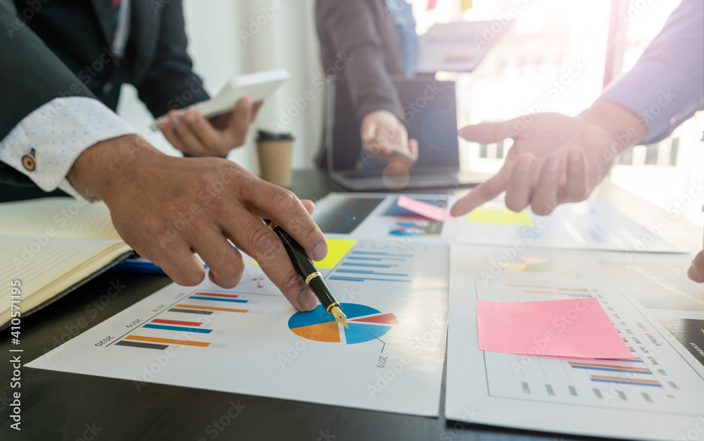 Teamwork process. Marketing strategy brainstorming, business people analyze business planning strategies for start-up. Teamwork process. Marketing strategy brainstorming, business people analyze business planning strategies for start-up.