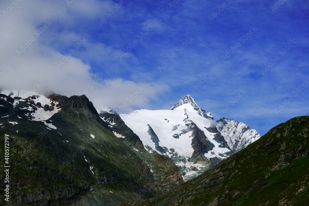 highest mountain of austria with a sharp peak and lot of snow with sky highest mountain of austria with a sharp peak and lot of snow with sky