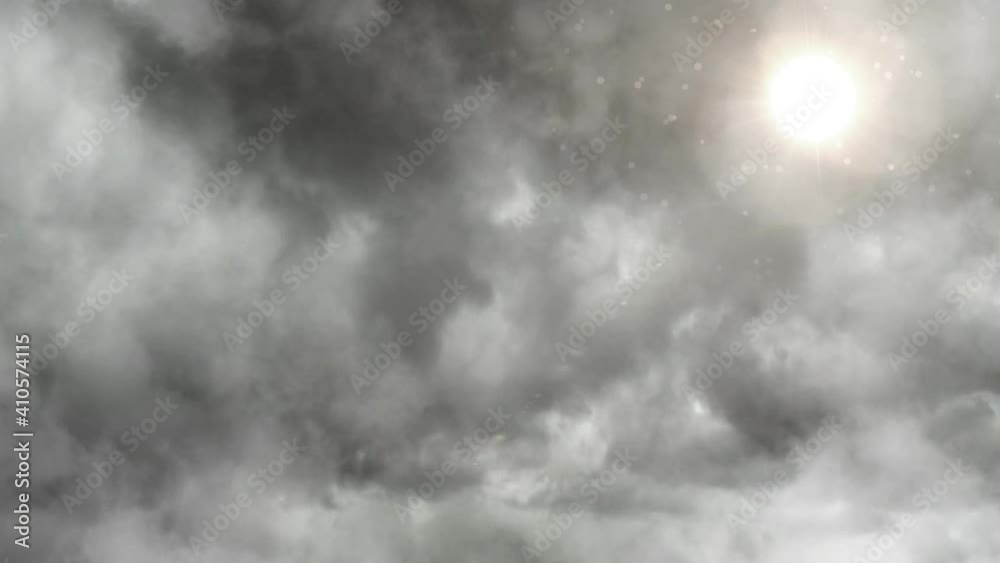 the sun shining amidst the gray and dark clouds. the sun shining amidst the gray and dark clouds.