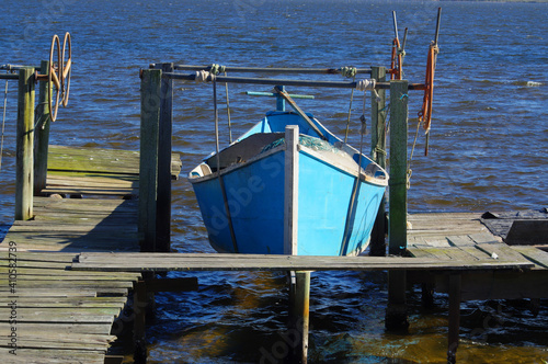 Beautiful shot of a fishing boat on the seashore photo