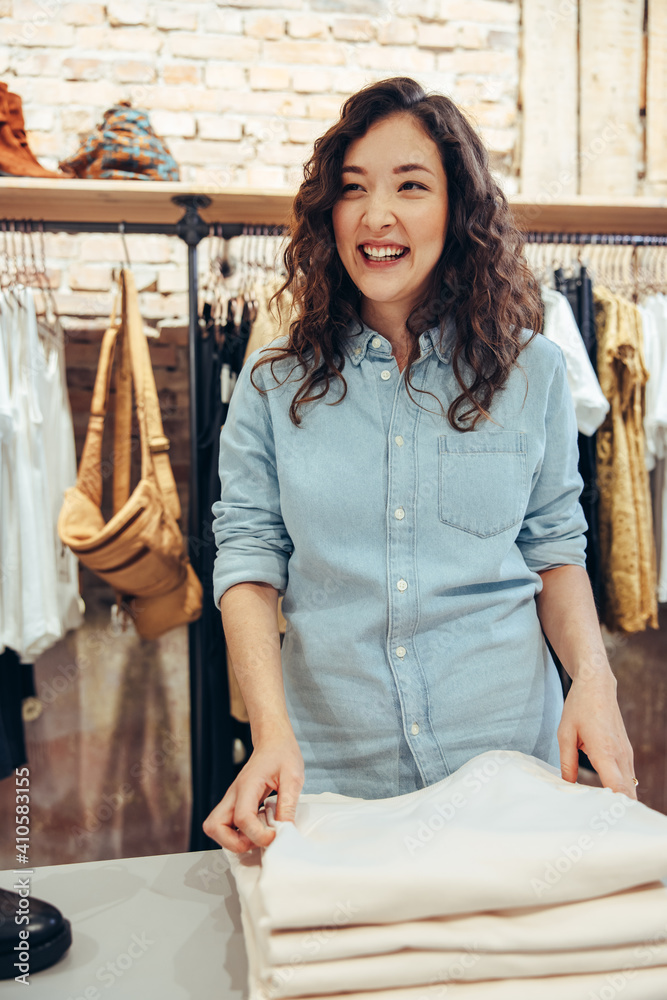 Smiling shopper in fashion store Smiling shopper in fashion store