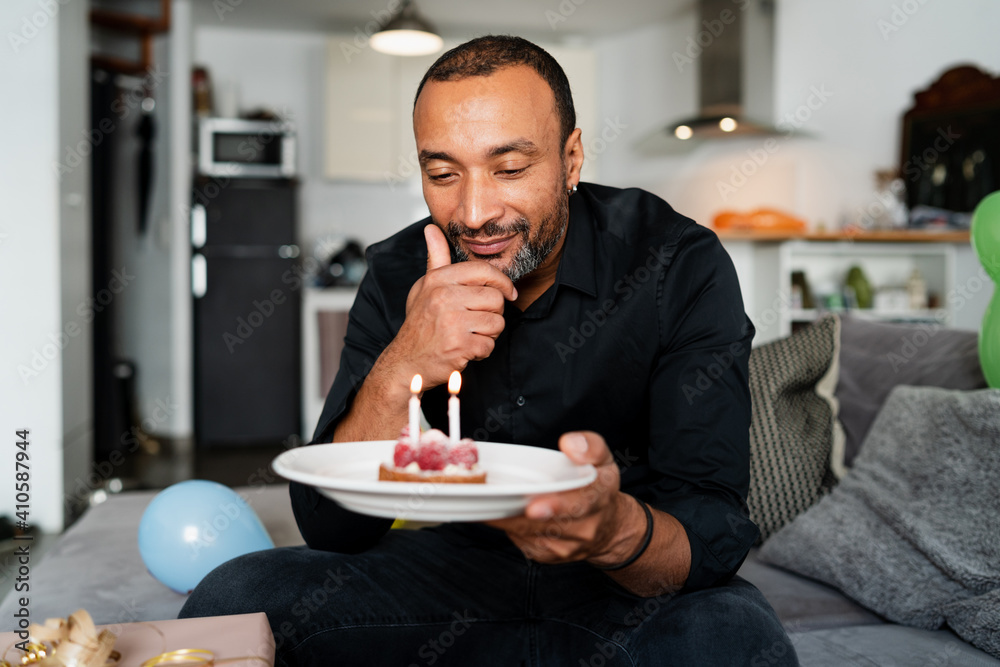 40 years old man celebrating his birthday at home 40 years old man celebrating his birthday at home