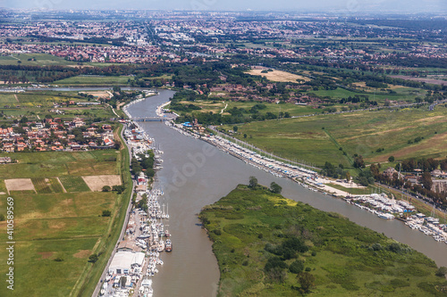 Top view of the Tiber river at its confluence with the Tyrrhenian sea near the city of Fiumicino. Italy