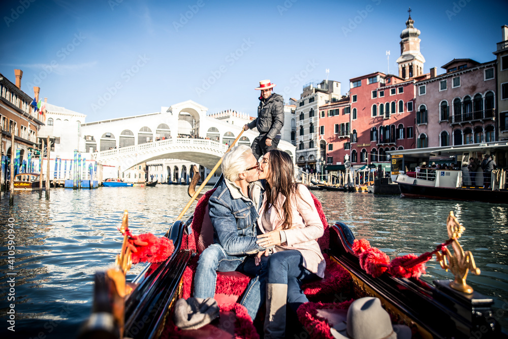 Happy young couple on vacation in  Venice