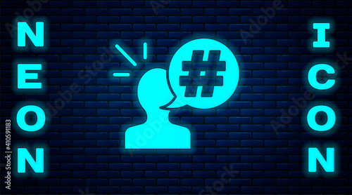 Glowing neon Protest icon isolated on brick wall background. Meeting, protester, picket, speech, banner, protest placard, petition, leader, leaflet. Vector.