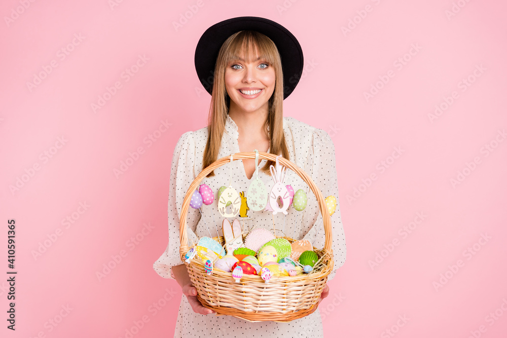 Photo of charming girl hold easter basket festive food wear retro cap dotted dress isolated pink color background