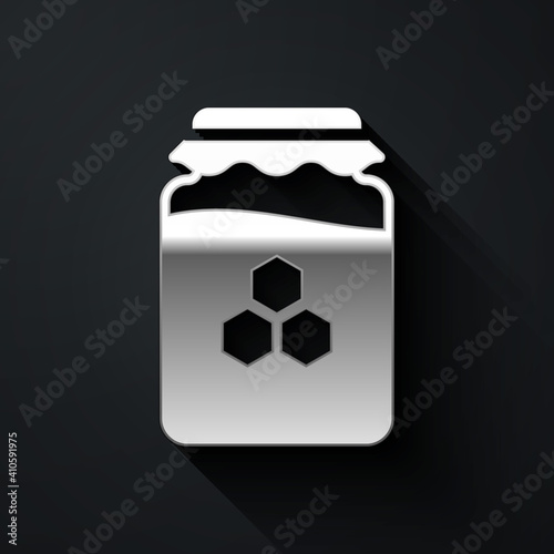 Silver Jar of honey icon isolated on black background. Food bank. Sweet natural food symbol. Long shadow style. Vector.