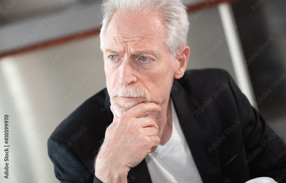 Portrait of thoughtful senior businessman Portrait of thoughtful senior businessman