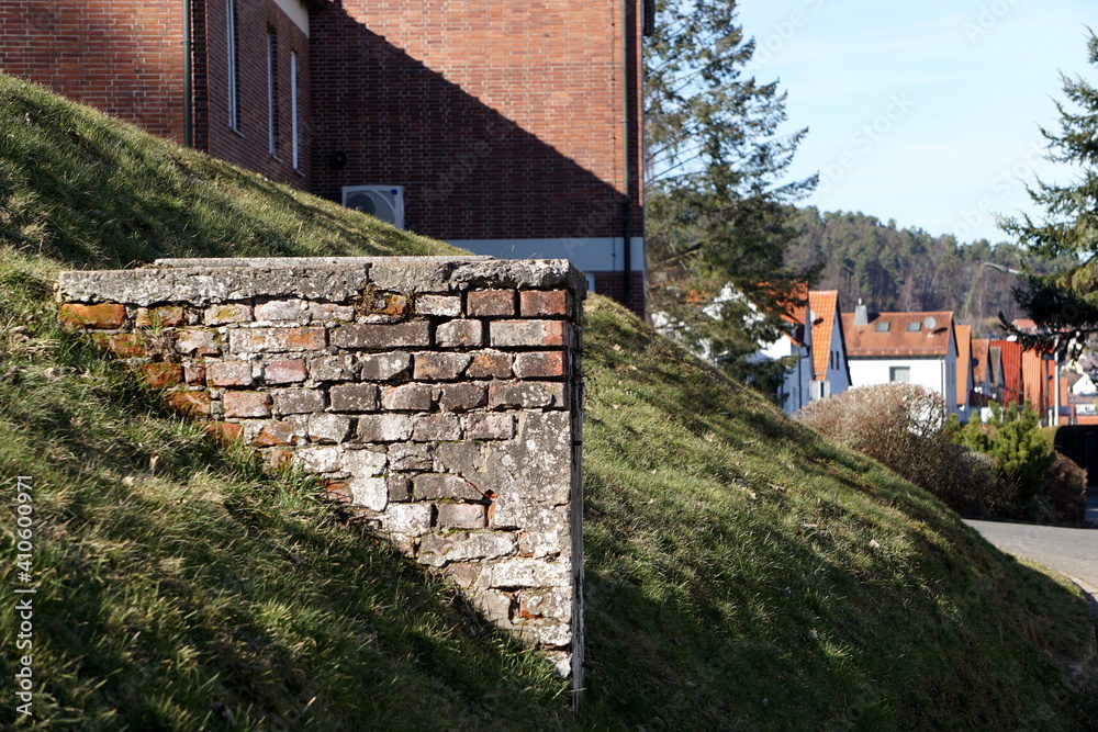 a stone wall next to a hiking trail in Marburg at the Hebronberg, Hessen, Germany, February a stone wall next to a hiking trail in Marburg at the Hebronberg, Hessen, Germany, February