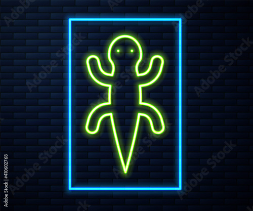 Glowing neon line Lizard icon isolated on brick wall background. Vector.