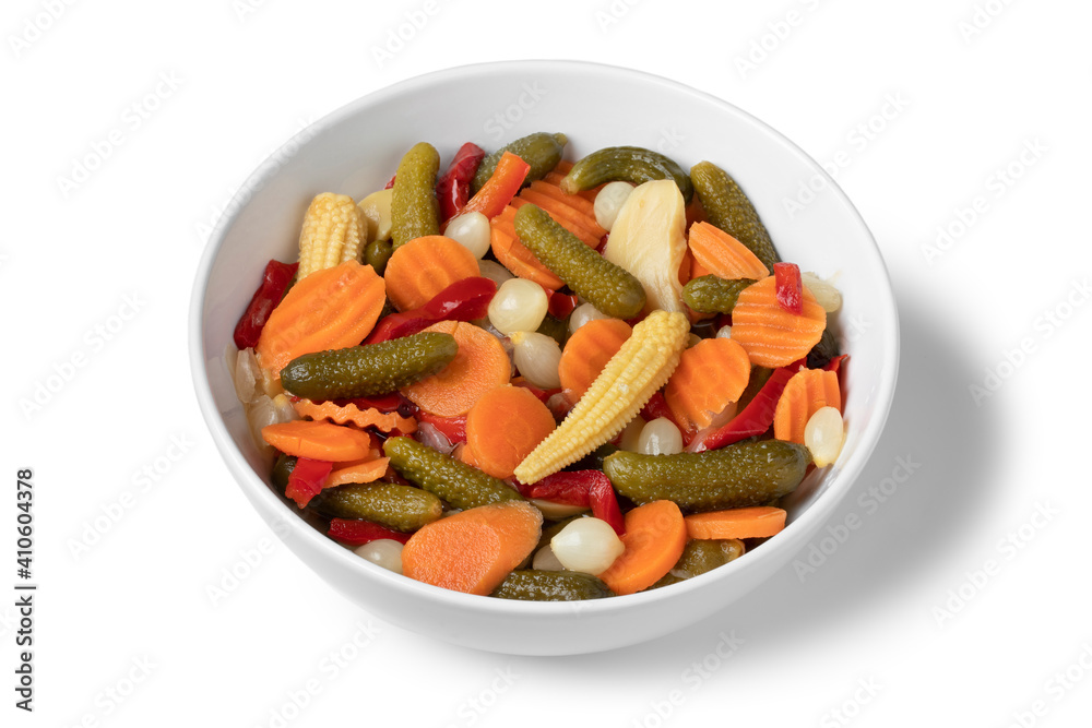 White bowl with homemade pickled vegetable mix close up White bowl with homemade pickled vegetable mix close up
