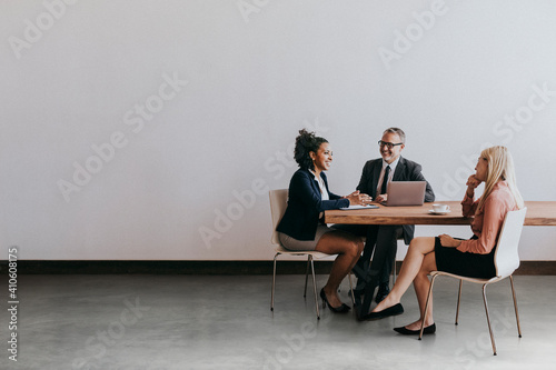 Business people discussing in a meeting room photo