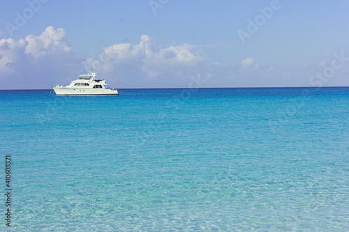 White yacht in the bright blue sea © rubchikova
