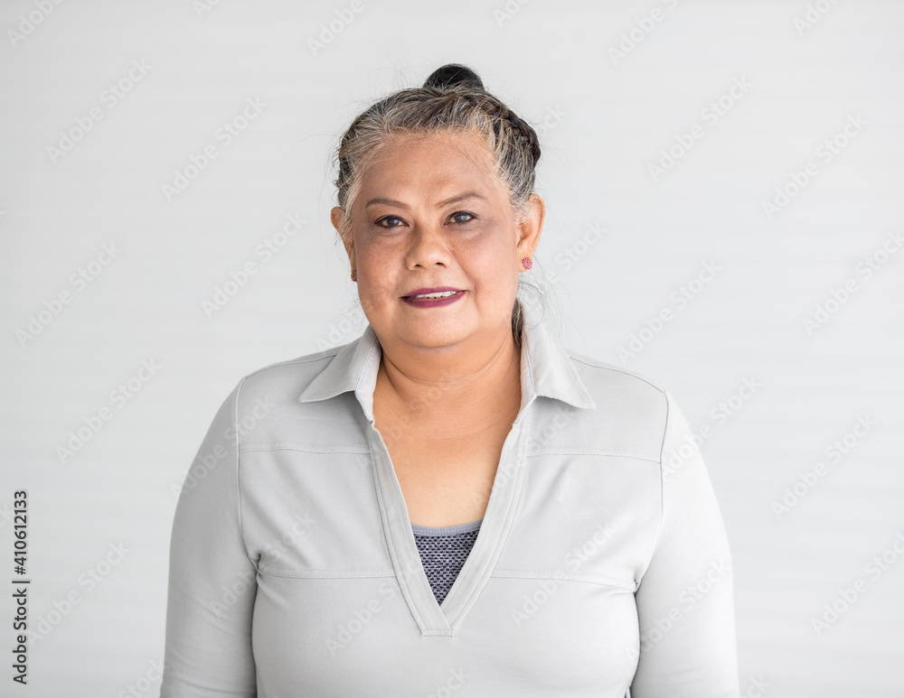 Portrait of senior older Asian woman with tender kindly smile Portrait of senior older Asian woman with tender kindly smile