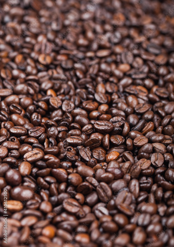 Close up fresh raw organic coffee beans top view background. Close up fresh raw organic coffee beans top view background.