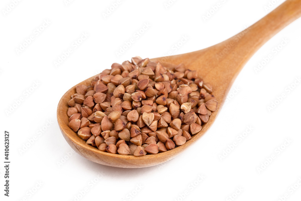 Buckwheat. Diet concept - Background texture of buckwheat - Macro shot of buckwheat texture. Buckwheat. Diet concept - Background texture of buckwheat - Macro shot of buckwheat texture.
