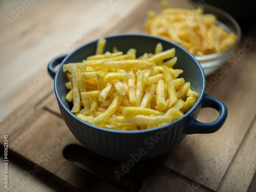 comparison of three servings of fries. Semi-finished product from the store. Handmade at home. Bought at McDonald's. photo