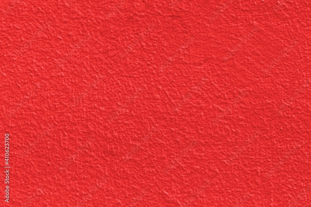 Fototapeta premium The cement wall is painted in bright red texture and background seamless