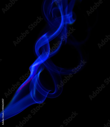 swirling movement of blue smoke group, abstract line Isolated on black background