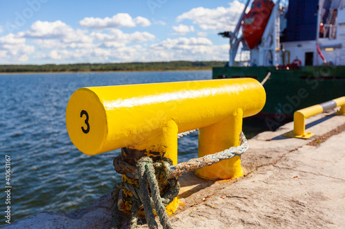 The ship is moored to the shore. The rope keeps the boat on the pier