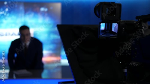 An anchorman tells the latest news in tv studio, 4k footage