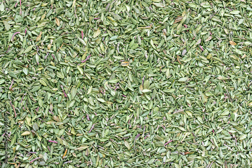 Dried and crushed thyme grass (Thymus). A fragrant plant used in medicine, cooking and cosmetology.