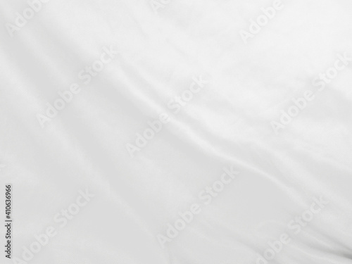 Soft white wrinkled fabric background © Nattawut
