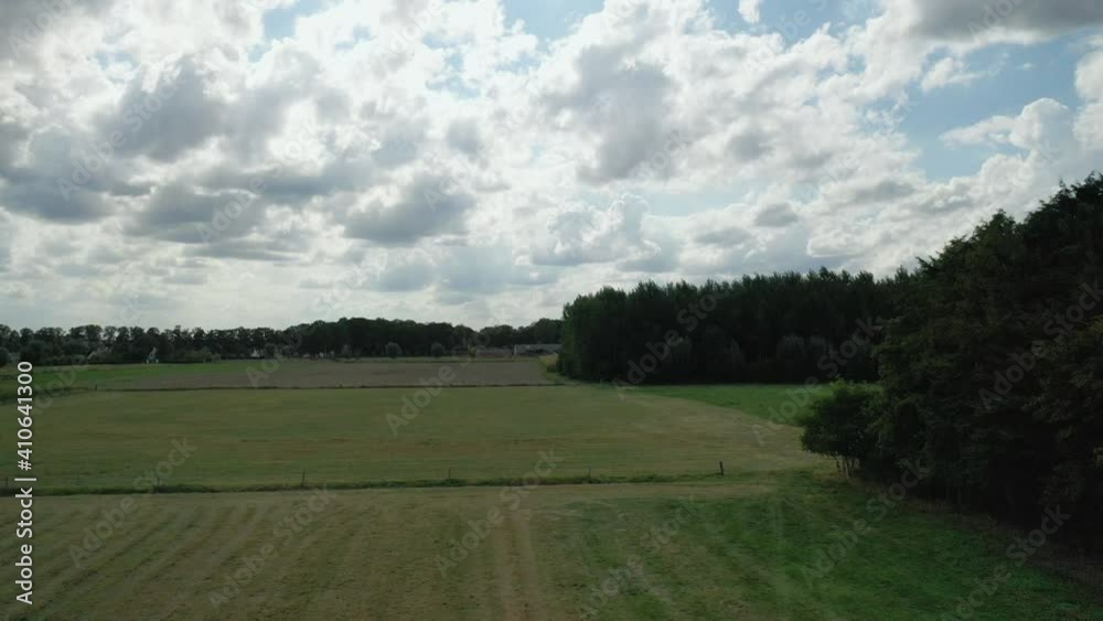 Aerial, pov, summer fields and cloudscape outside of Gent, Belgium Aerial, pov, summer fields and cloudscape outside of Gent, Belgium