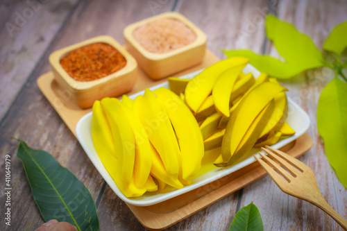 Pickled mango fruit marinated in salt and pepper