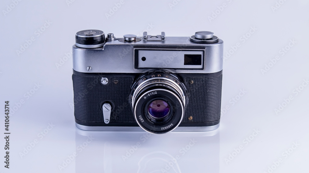 old soviet camera with flash on white background