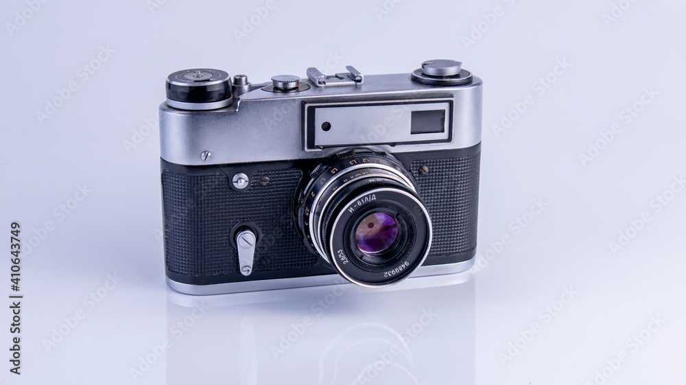 old soviet camera with flash on white background