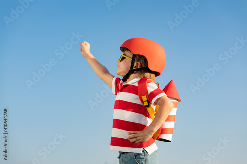 Happy child playing outdoor photo