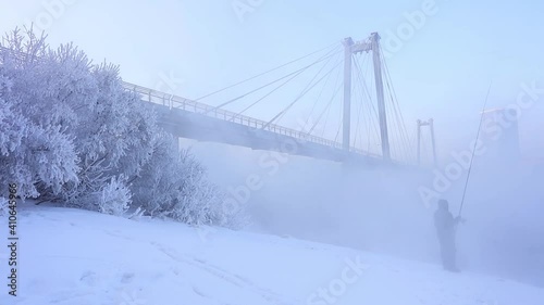 Wallpaper Mural The town bridge over the river in the winter time. Urban landscape with a bridge over the river and a very cold season Torontodigital.ca