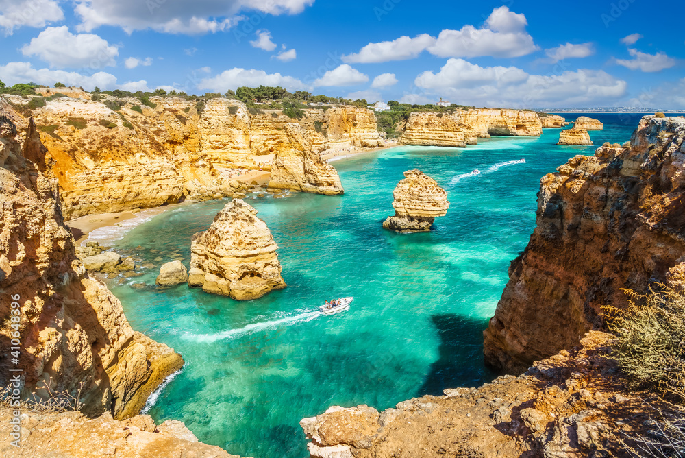 Landscape with beautiful Praia da Marinha, one of the most famous beaches of Portugal, located on the Atlantic coast in Lagoa, Algarve Landscape with beautiful Praia da Marinha, one of the most famous beaches of Portugal, located on the Atlantic coast in Lagoa, Algarve