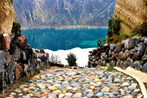 View of a water-filled crater lake and the most western volcano in the Ecuadorian Andes