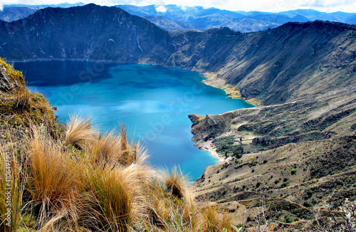 View of a water-filled crater lake and the most western volcano in the Ecuadorian Andes photo