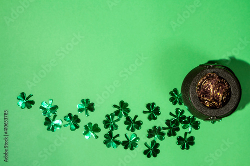 St Patrick's Day Pot of Gold and shamrocks over a green background