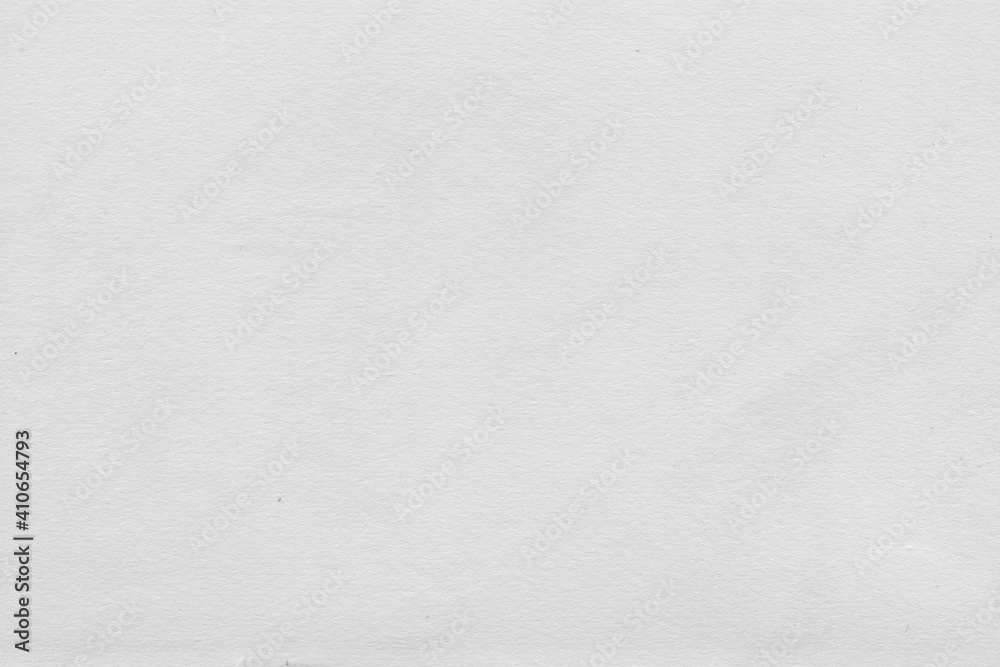 Cardboard gray texture close-up. Light old paper background. Grunge concrete wall. Vintage blank wallpaper. Cardboard gray texture close-up. Light old paper background. Grunge concrete wall. Vintage blank wallpaper.