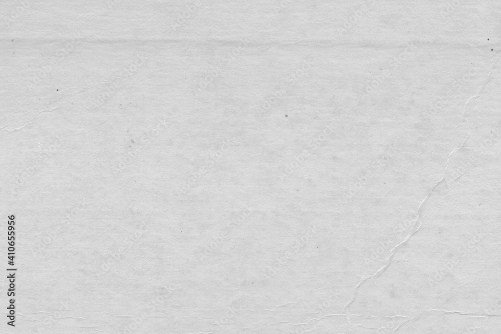 Fototapeta premium Cardboard gray texture close-up. Light old paper background. Grunge concrete wall. Vintage blank wallpaper.