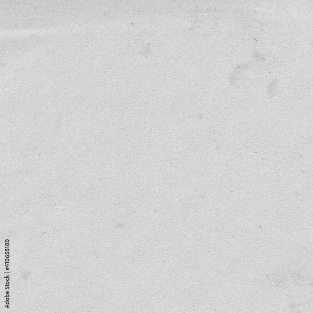Cardboard gray texture close-up. Light old paper background. Grunge concrete wall. Vintage blank wallpaper. Cardboard gray texture close-up. Light old paper background. Grunge concrete wall. Vintage blank wallpaper.