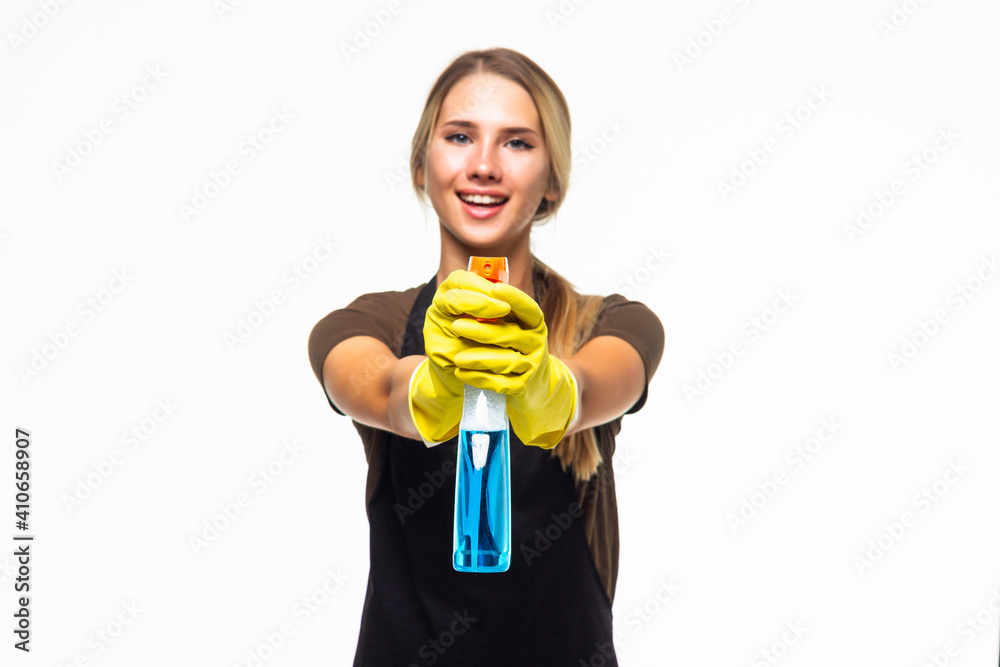 Portrait of woman holding a sprayer isolated on white background. Ready for cleaning Portrait of woman holding a sprayer isolated on white background. Ready for cleaning