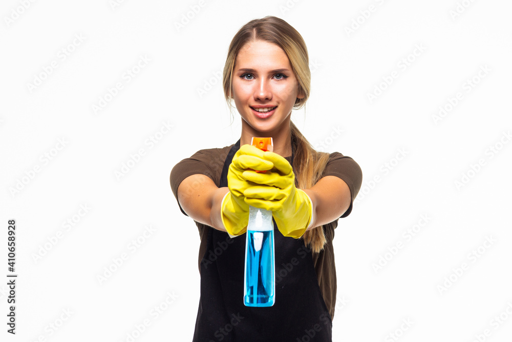 Smiling woman holding bottle of chemistry for cleaning house isolated Smiling woman holding bottle of chemistry for cleaning house isolated