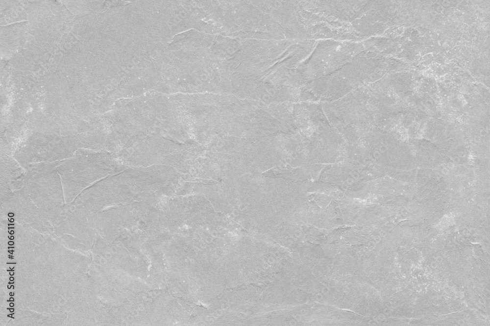 Naklejka premium Cardboard gray texture close-up. Light old paper background. Grunge concrete wall. Vintage blank wallpaper.