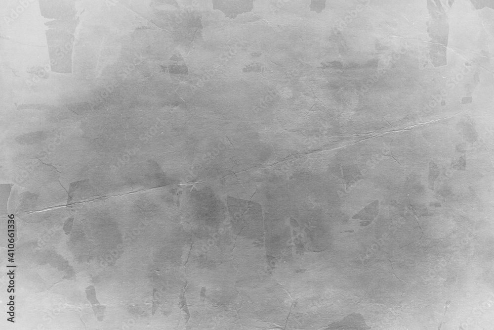 Fototapeta premium Cardboard gray texture close-up. Light old paper background. Grunge concrete wall. Vintage blank wallpaper.
