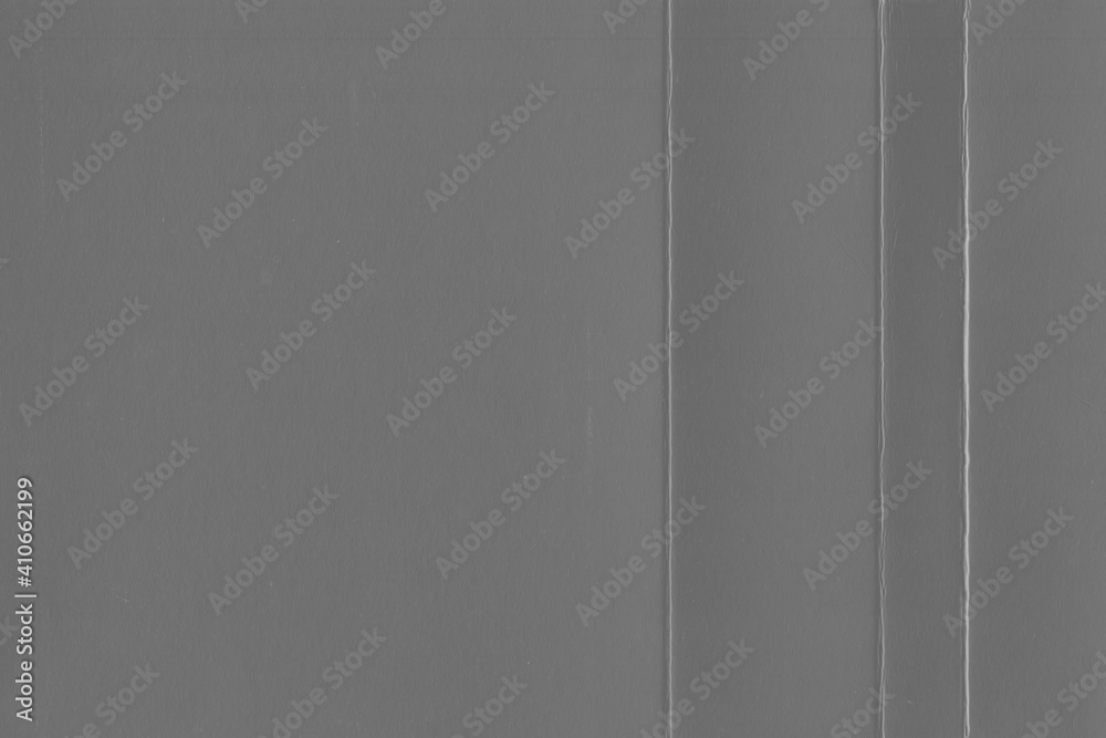 Cardboard gray texture close-up. Light old paper background. Grunge concrete wall. Vintage blank wallpaper. Cardboard gray texture close-up. Light old paper background. Grunge concrete wall. Vintage blank wallpaper.