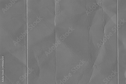 Cardboard gray texture close-up. Light old paper background. Grunge concrete wall. Vintage blank wallpaper.