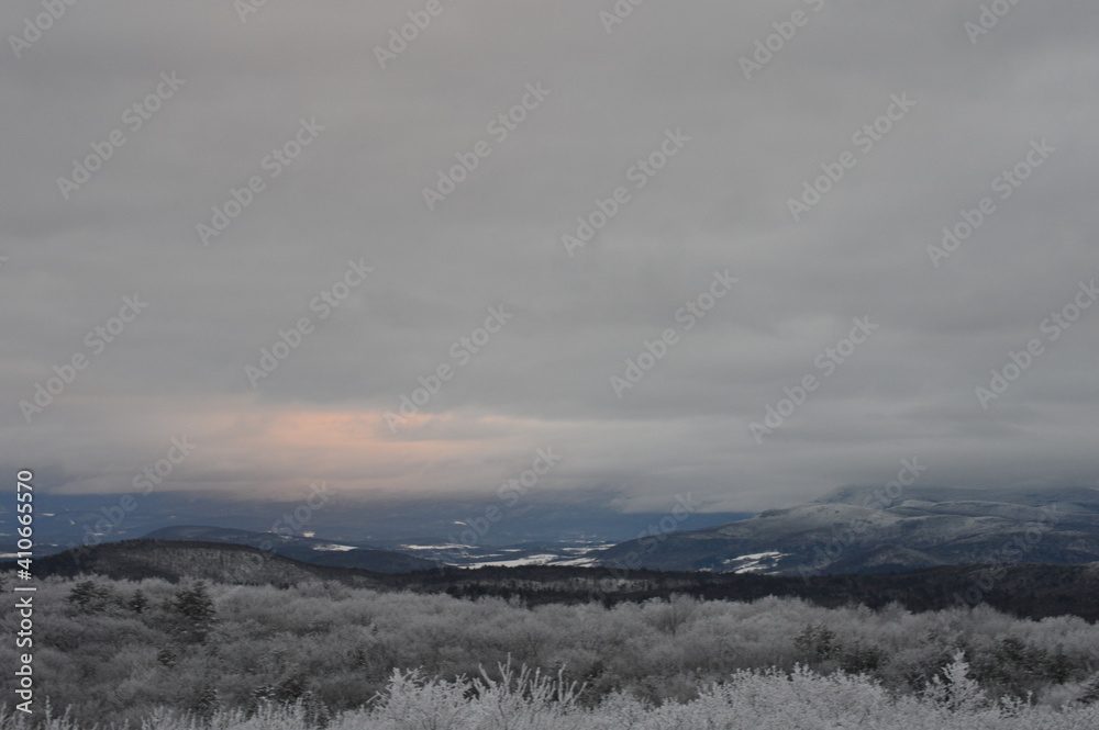 Glowing Sun Behind Morning Clouds
Mountain Landscape